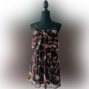 Dress with feathers.